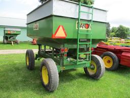 Dakon Model 231 gravity wagon w/JD 740 running gear, 9.00R-20 truck tires