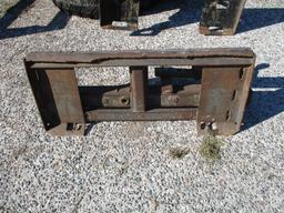 Skid loader receiver hitch