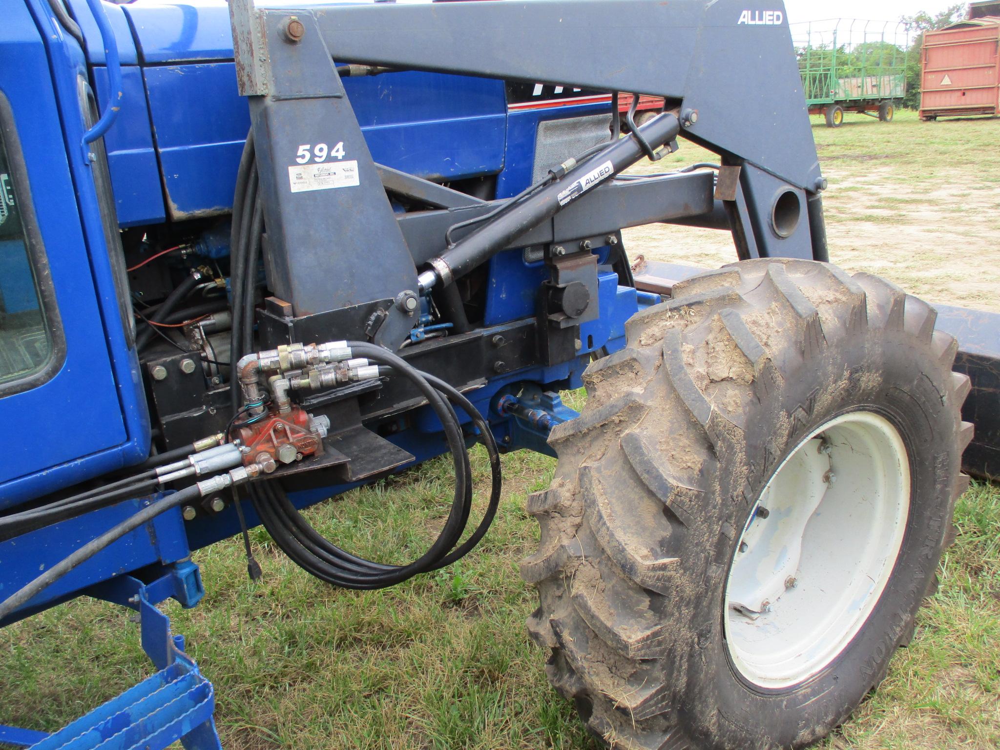 Ford 7710 MFWD, 6,333 Hrs. showing, cab, w/Allied 594  hyd loader 7' bucket & bale fork, 3pt. 3 hyd