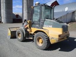 2013 John Deere 324J, 13,965 Hrs. 4x4, cab. AC, heat, JRB coupler, Aux Hyd, bucket, New tires, top