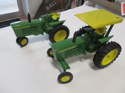 4291-(2) ORIGINAL JD NEW GEN TRACTORS,  1 TRACTOR HAS WIDE FRONT AND ROPS, 1/16TH SCALE