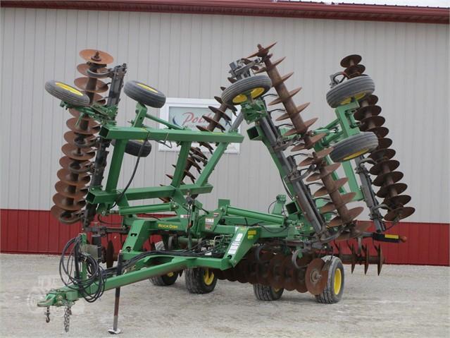 10948- JOHN DEERE 637 DISC (2009)