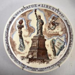 FOUR SOUVENIR PLATES