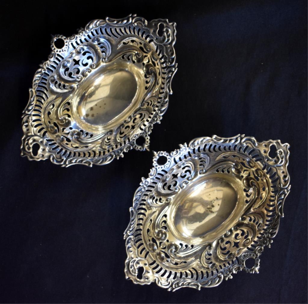 FOUR SMALL STERLING SILVER DISHES