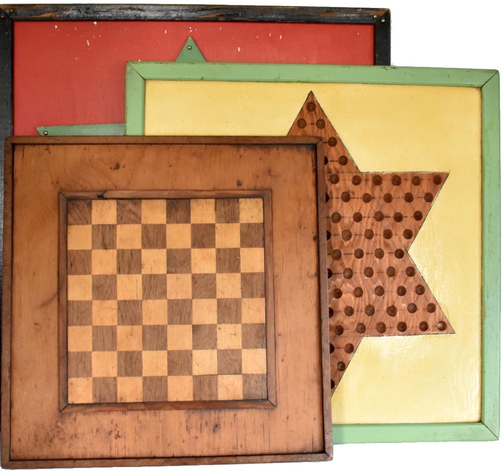 THREE PRIMITIVE WOODEN GAME BOARDS