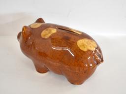 THREE PRIMITIVE PIGGY BANKS