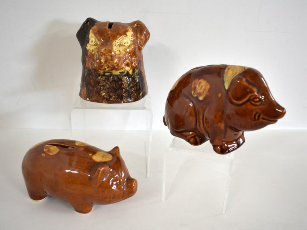 THREE PRIMITIVE PIGGY BANKS