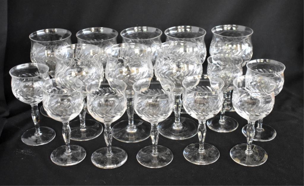 FOURTEEN CLEAR CUT STEMMED GLASSES