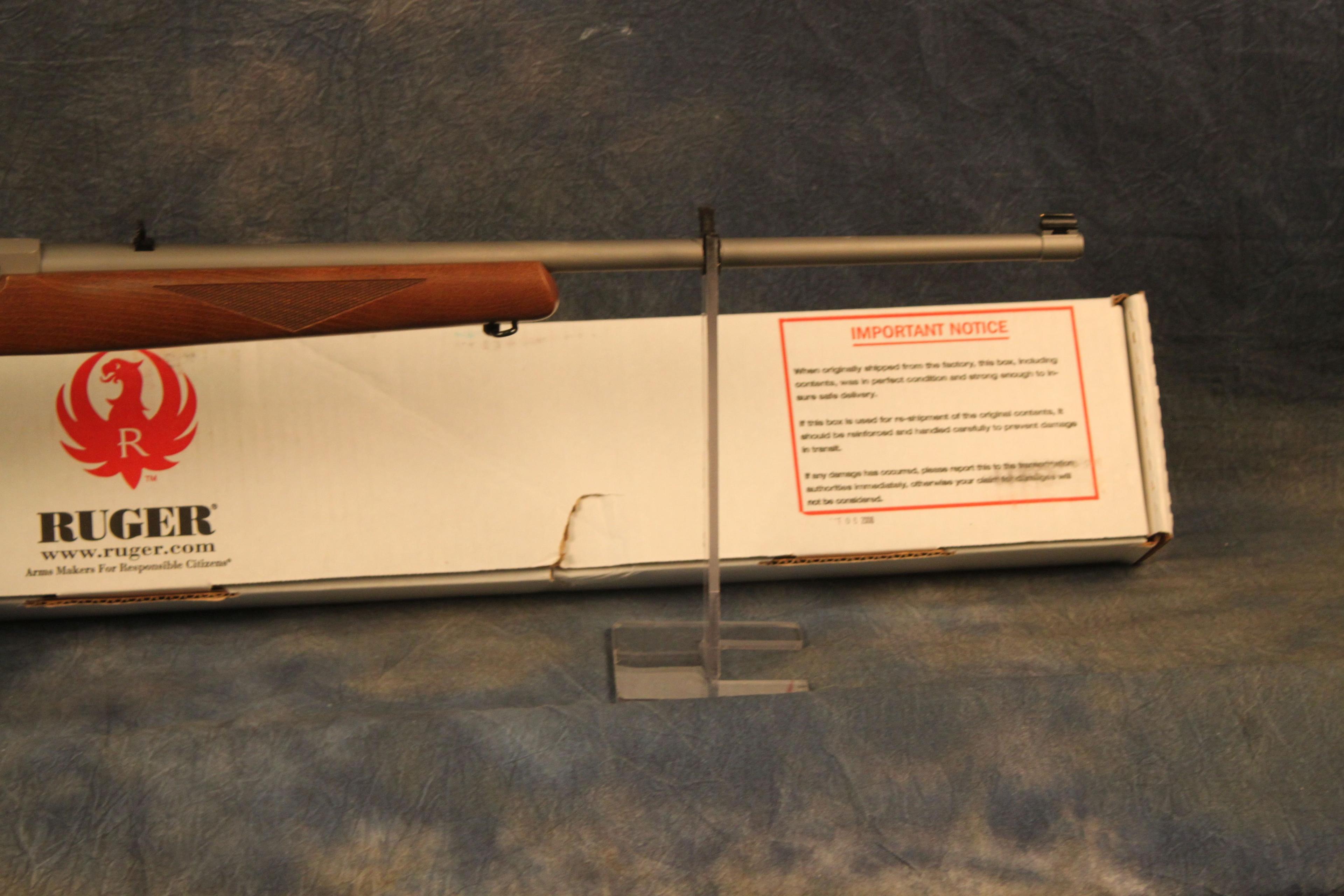 33. Ruger 10/22 Deluxe, 22” Barrel, Brushed Stainless w/ Swivels SN:352-49437