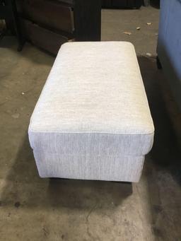 Benchcraft Silsbee Ottoman in Sepia