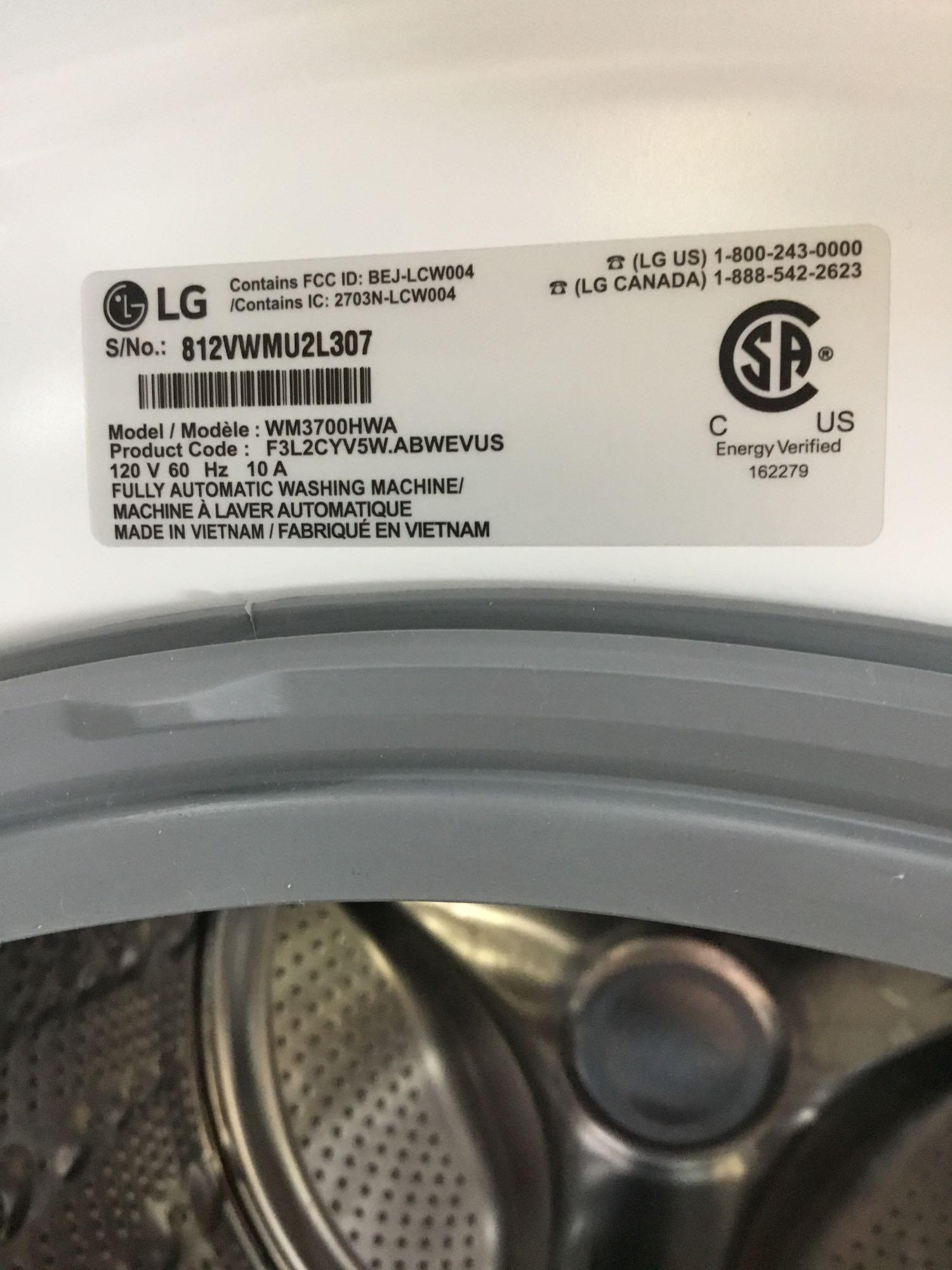 LG 4.5 Cu. Ft. Steam Inverter Direct Drive Front Load Electric Washer Machine ***TURNS ON***
