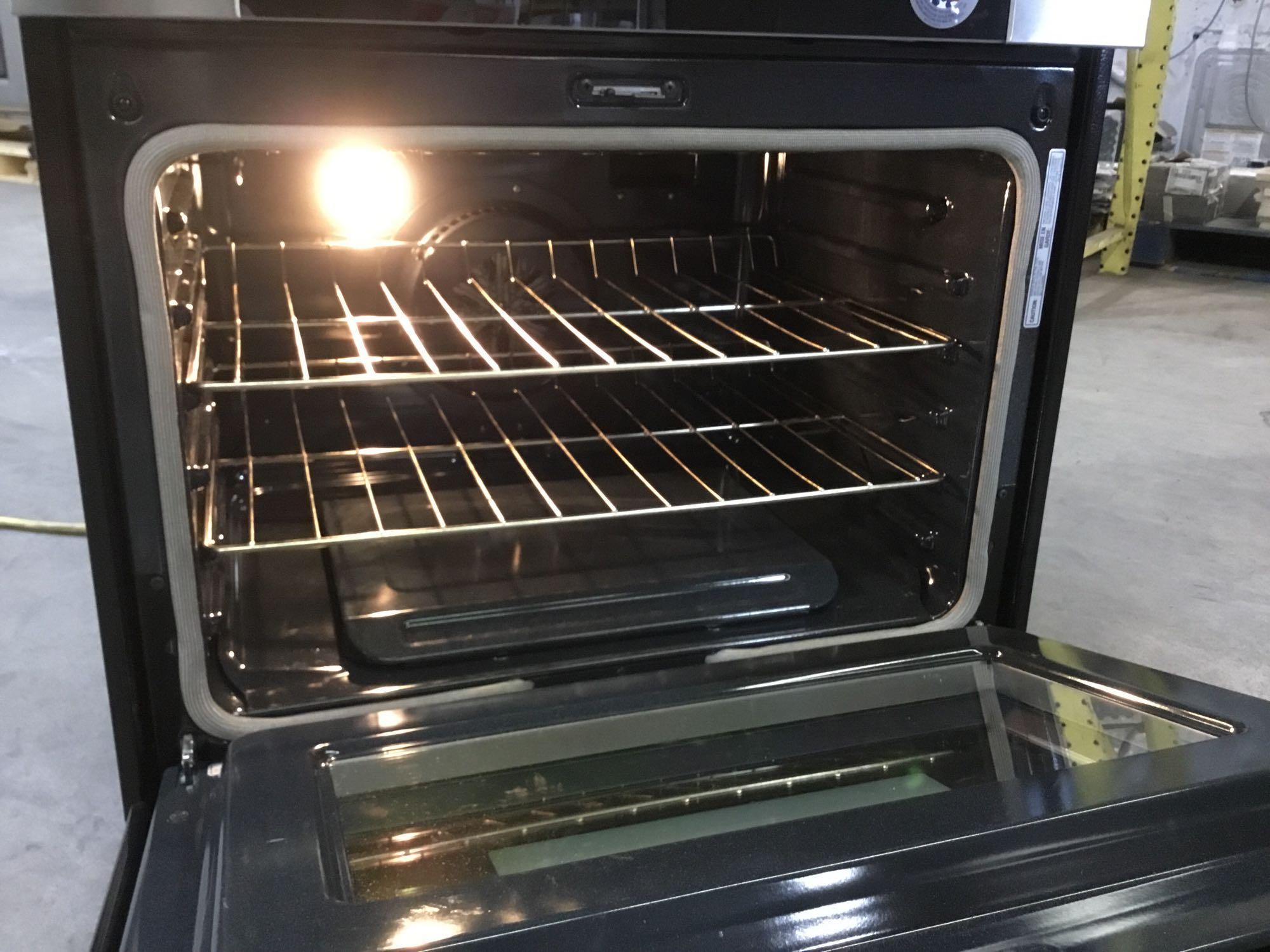 Whirlpool 6.0 Cu. Ft. Gas Double Oven Range with EZ 2 Lift Hinged Grates ***TURNS ON***
