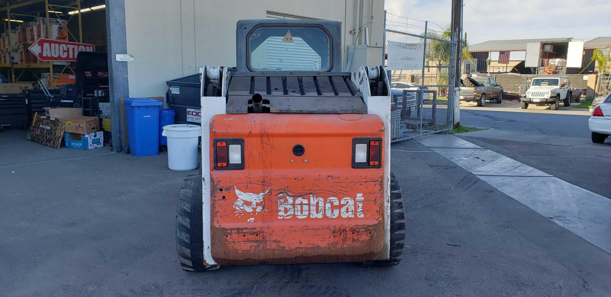 2005 BobCat S220 Turbo with High Flow and 78in. Smooth Utility Bucket
