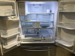 Samsung 24.6-cu ft French Door Refrigerator with Dual Ice Maker***GETS COLD***