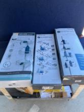 Box Lot of Shower Pole Caddy?s and Towel Bars