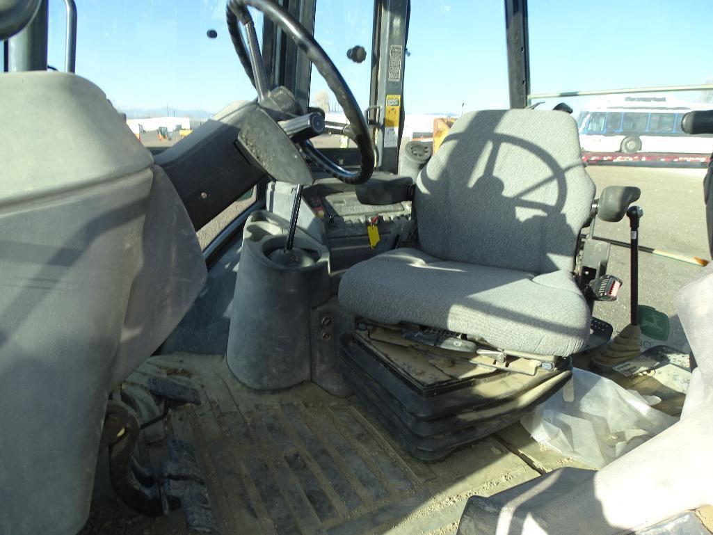 2006 John Deere 710G 4WD Loader/Backhoe, Extendahoe, Auxiliary Hydraulics, EROPS, A/C & Heat, 24in