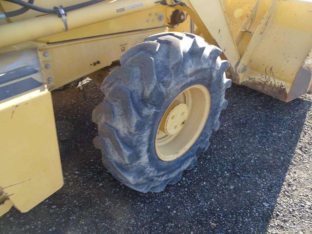 2002 John Deere 310SG 4WD Loader/ Backhoe, Extendahoe, Auxiliary Hydraulics, Turbo, EROPS, 16in Hoe