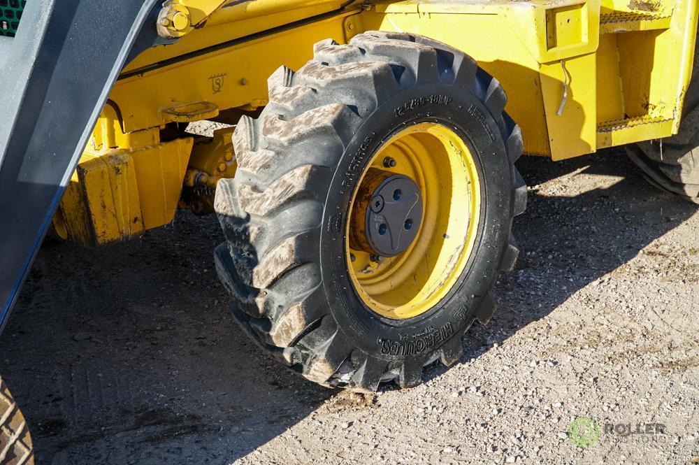 2002 John Deere 310SG 4WD Loader/Backhoe, Extendahoe, Auxiliary Hydraulics, EROPS, 24in Hoe Bucket,