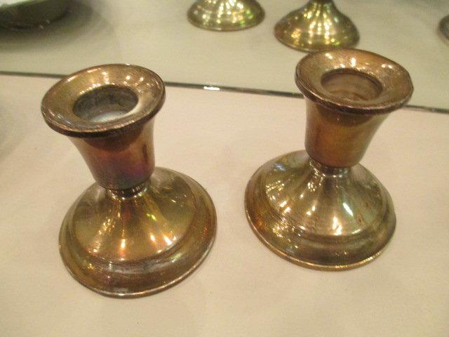 Pair of Sterling weighted Candle holders con 1