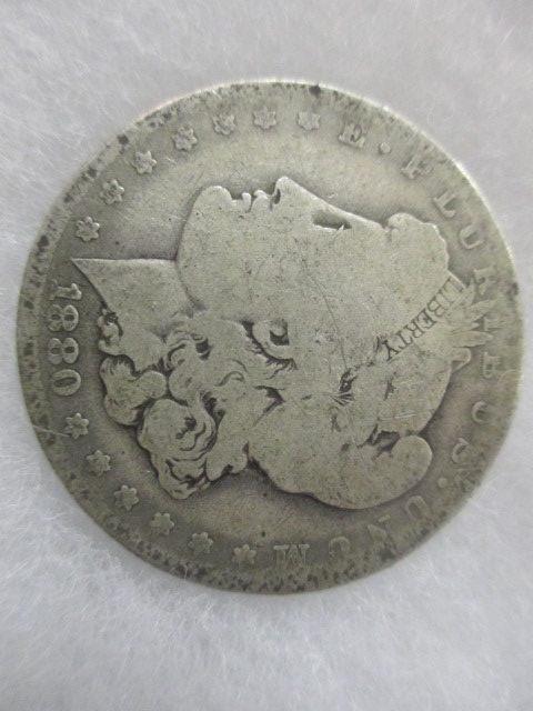 1880-O Morgan Dollar con 200