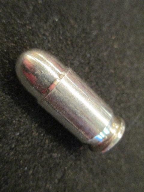1 oz Solid  .999 Fine Silver Bullet 45Cal? con 200