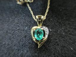 Ladies 16" 14K Gold Chain and Pendant with Diamond and Green Stone - con 668