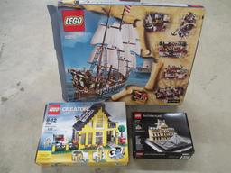 Four Lego Sets Put together includes boxes