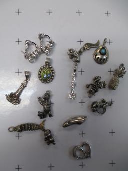 14 Sterling Silver Charms - con 583