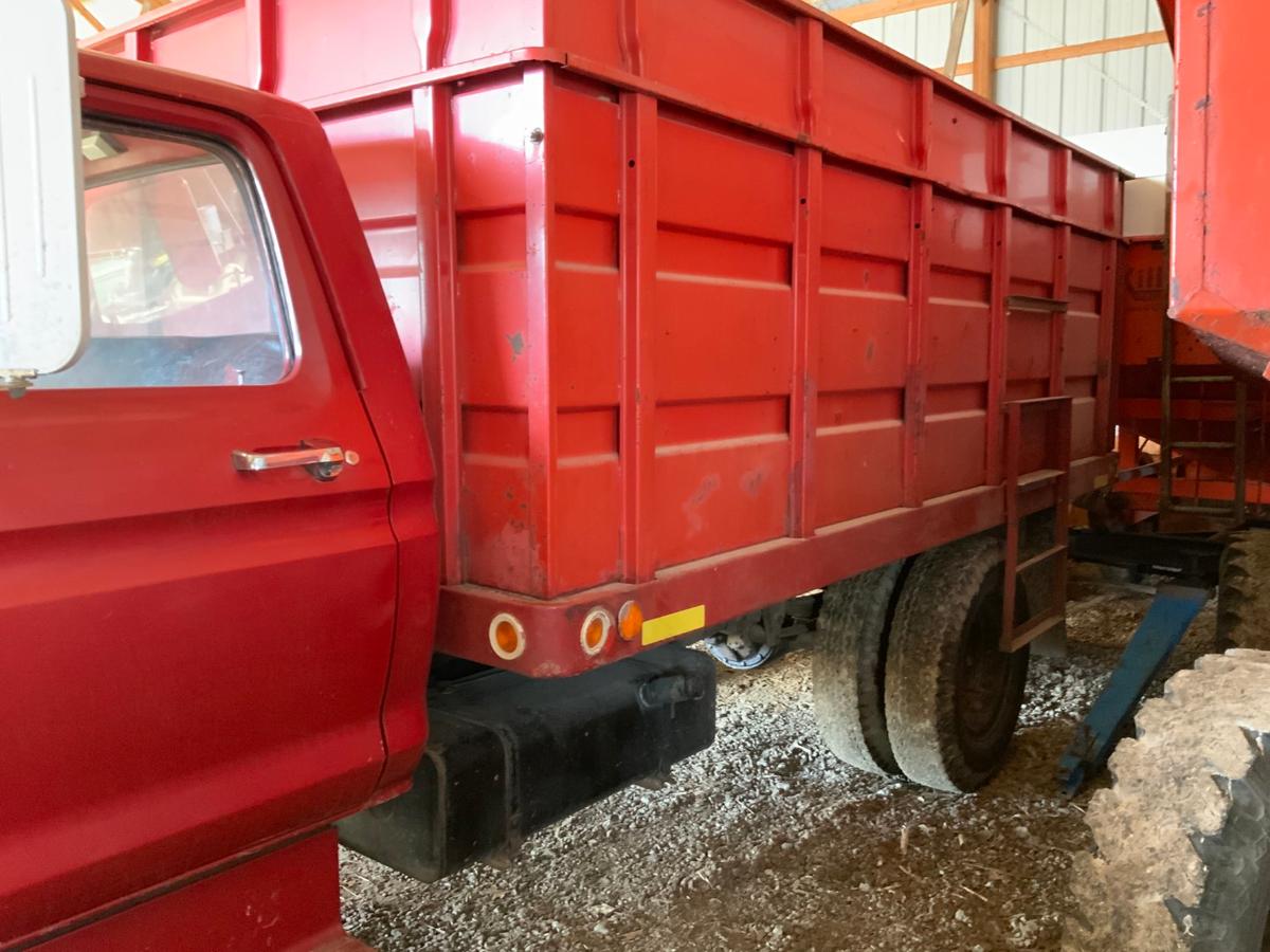 ’75 FORD 600, gas eng., 4x2 trans., 13’ Knapheide bed w/ wood floor & tin topped, twin cyl. Hoist, O