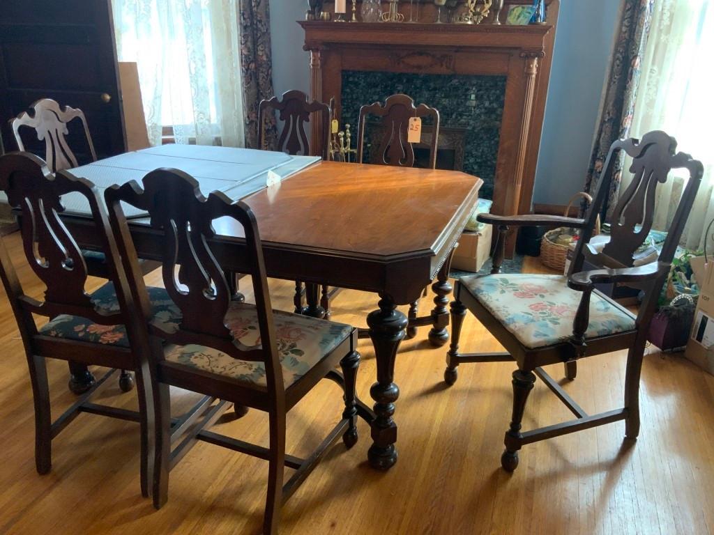 Dining room set. Table w/ 6 chairs. Buffet ( Table has 2 leaves and table pads)