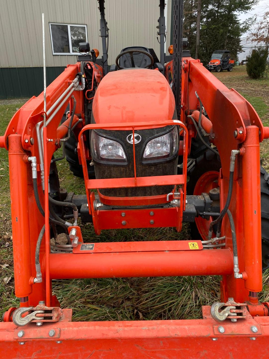 12 Kubota M7040 MFWD diesel tractor w/ROPS canopy w/LA1153 hyd. Kubota loader & mat. Bucket, 3-SCV’s