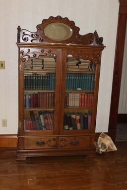 Oak 4 shelf Bookcase with bottom drawers and fancy carving and glass doors-41" x 12.5" x 75"