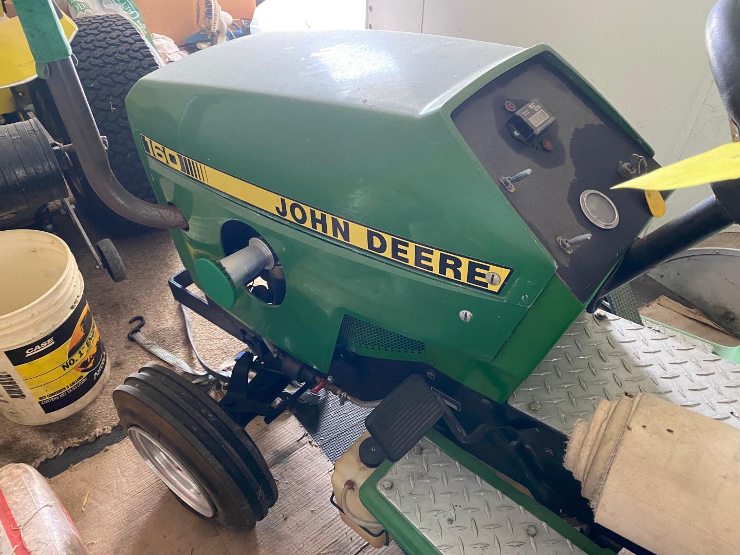 John Deere 160 w/skid plates & wts. This was a successful puller in the 1000-1100# class.