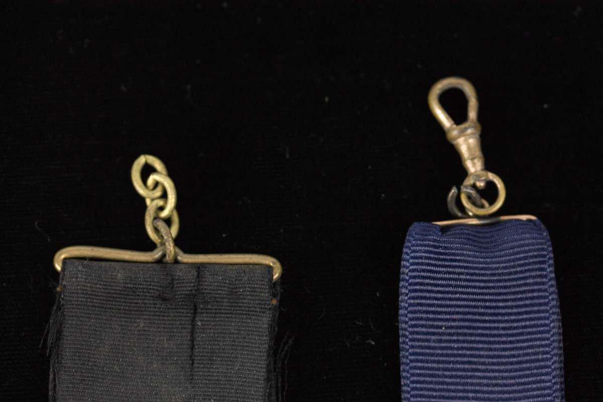 TWO ANHEUSER BUSCH ADVERTISING WATCH FOBS