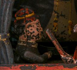 A 19TH C. PUNCH AND JUDY CAST IRON MECHANICAL BANK