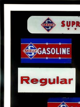 A COLLECTION OF FRAMED SKELLY GAS PUMP PLATES