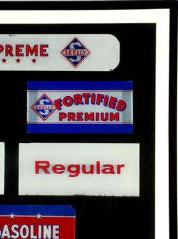 A COLLECTION OF FRAMED SKELLY GAS PUMP PLATES