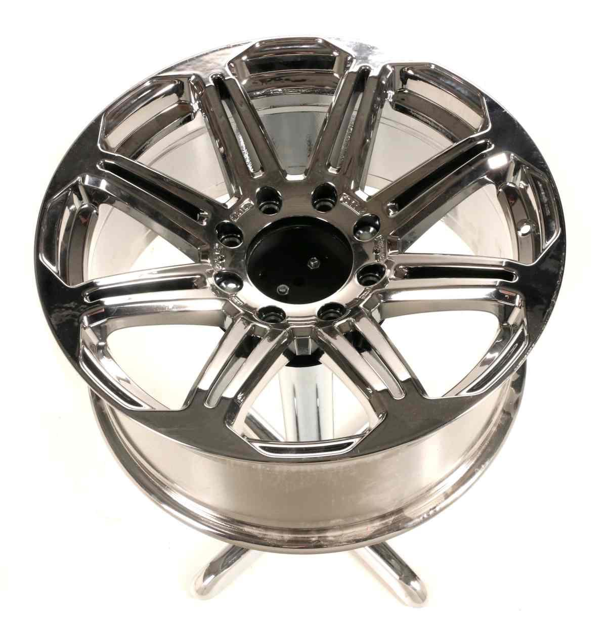 'STAND TABLE' FASHIONED FROM CHROME TRUCK WHEEL