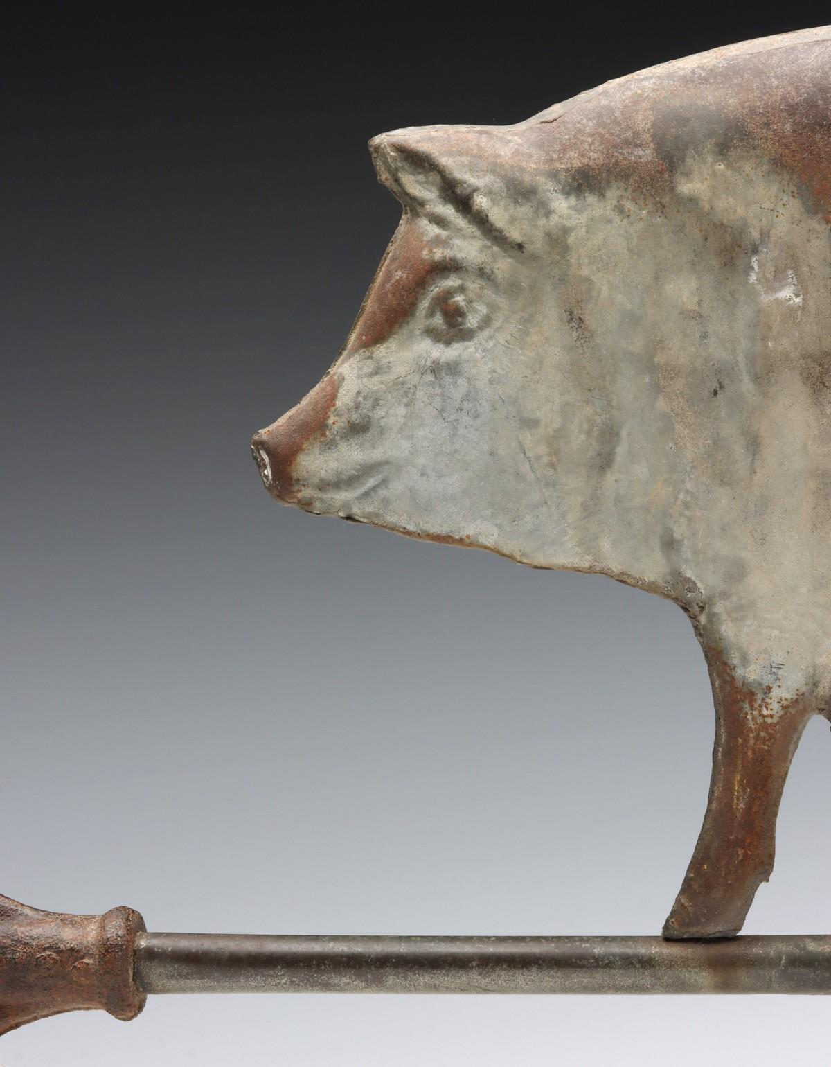 AN UNUSUAL KING WEATHER VANE WITH FIGURAL PIG