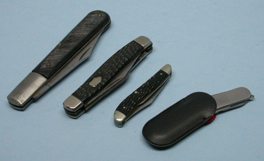 Four Collector Pocket Knives (A)