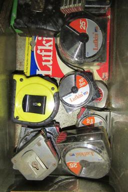 TOOL BOX FULL OF TORPEDO LEVELS AND TAPE MEASURES