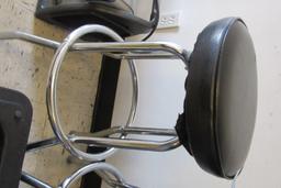 PAIR OF CHROME AND PADDED BAR STOOLS AND BOOSTER CHAIR