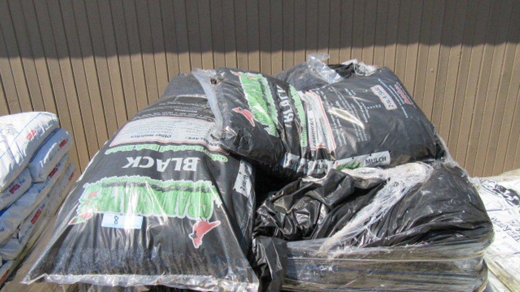 APPROXIMATELY (32) BAGS OF BLACK BARK MULCH