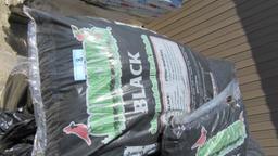 APPROXIMATELY (32) BAGS OF BLACK BARK MULCH