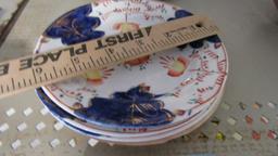 4 VINTAGE PLATES WITH FLOWER & BLUE COLORING