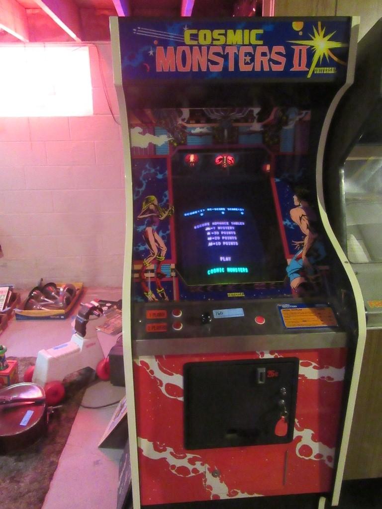 COSMIC MONSTERS II UNIVERSAL ARCADE GAME. SOLD AS IS. TURNS ON, BUT SCREEN DOESN'T OPERATE PROPER