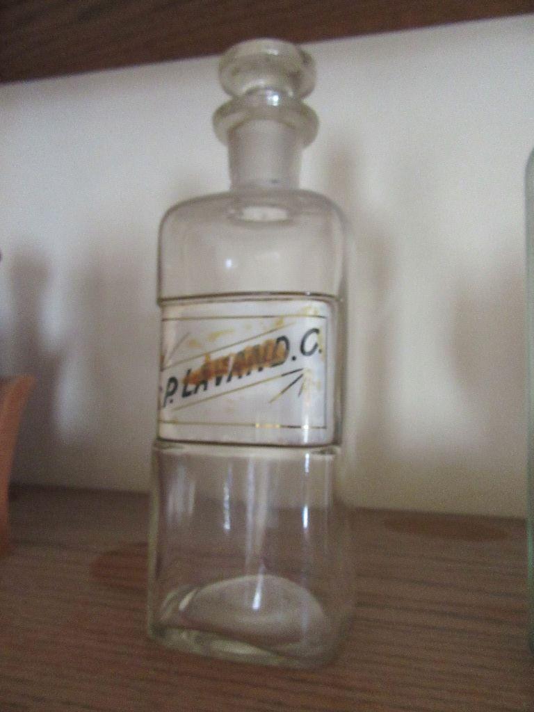 PHARMACY BOTTLE LABELED SP. LAVANO. C.