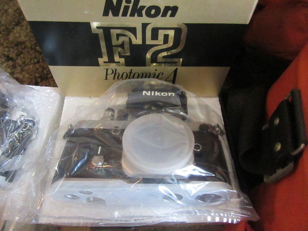 VARIETY OF NIKON CAMERAS, LENSES, FILTERS, CASE, AND ETC