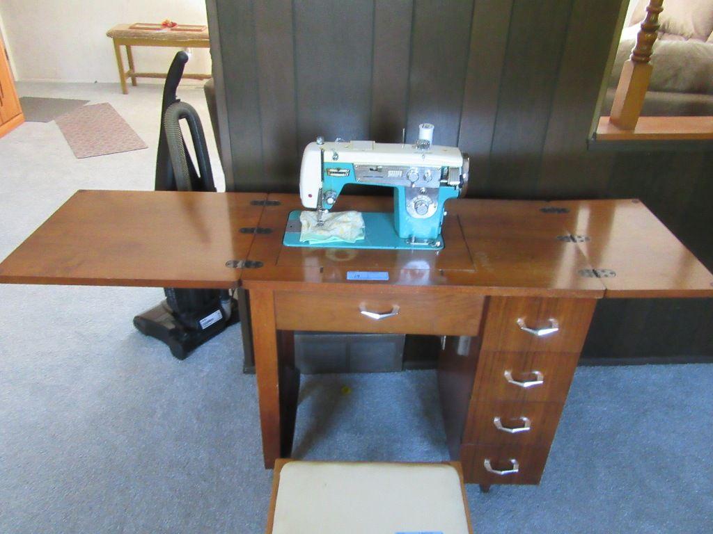 GOOD HOUSEKEEPER SEWING MACHINE, CABINET AND CONTENTS