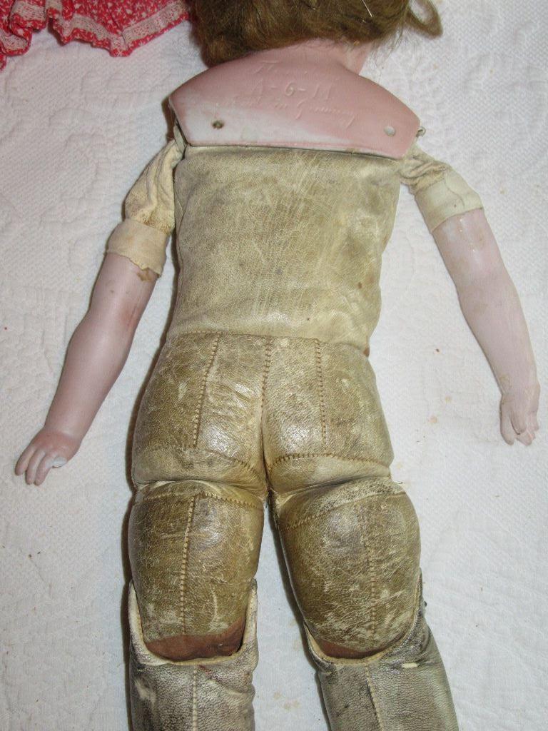 MADE IN GERMANY DOLL NUMBER A-6-M THEODORE. LEATHER AND SAWDUST JOINTED APP